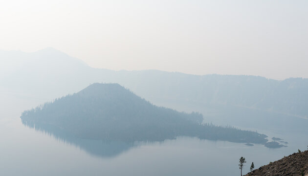 USA, OR, Crater Lake.  The famous lake obscured by dense smoke from nearby forest fires.