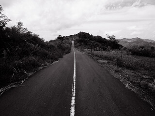 Winding road overlooking tropical coastline, Lombok Indonesia