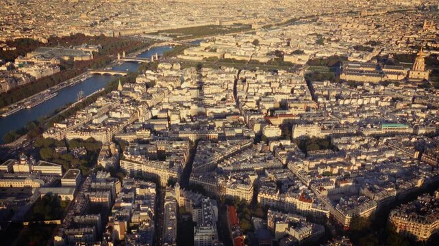 Showcasing Parisian charm and nostalgia an aerial view of Paris with the Seine River Shot in a Super 8 film style the footage has a blurry handheld retro film look travelogues documentaries and commer