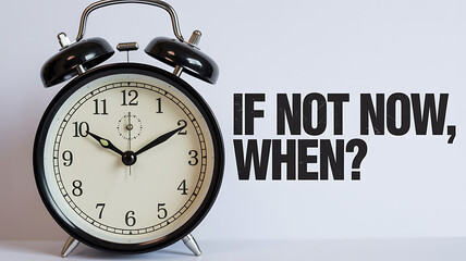 Vintage alarm clock with motivational quote If Not Now When on white background