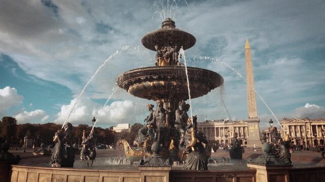 Highlighting Parisian elegance the fountain at Place de la Concorde with the Obelisk in the background Shot in a Super 8 film style with a blurry handheld retro aesthetic travel b-roll documentaries o