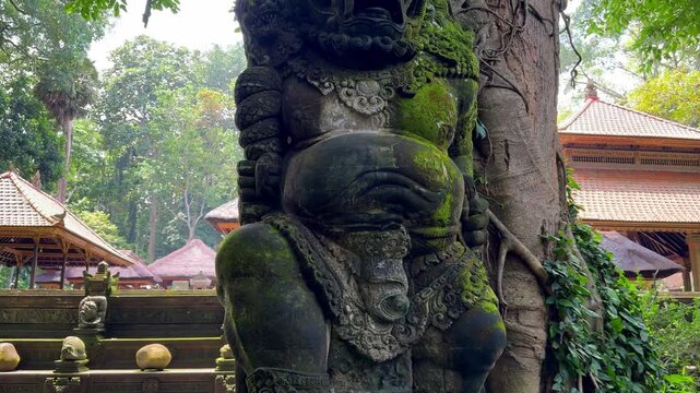 Ancient statue in Ubud Monkey Forest Bal