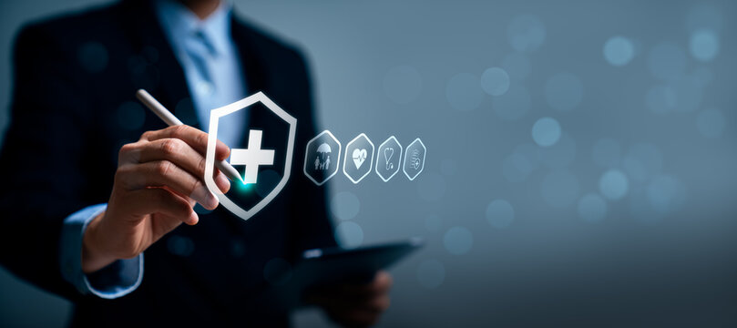 Digital health insurance and medical protection concept with business professional verifying healthcare coverage policy on interface, representing safety, family protection, healthcare benefits