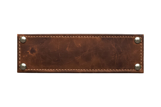 Brown leather banner with white stitching and metal rivets, providing a textured background label or tag with copy space on transparent background
