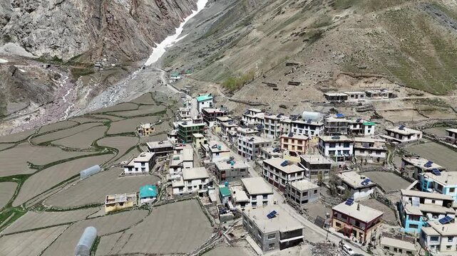 Drone Shot of Mudh Village Settlement Surrounded by Himalayan Mountains