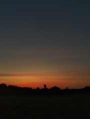 Obraz premium Deep orange sunset light on sky 