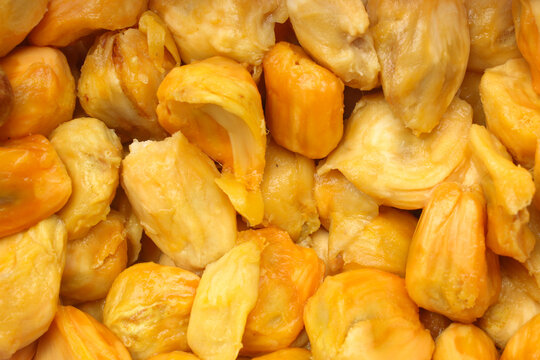 The texture of ripe cempedak fruit flesh is bright yellow