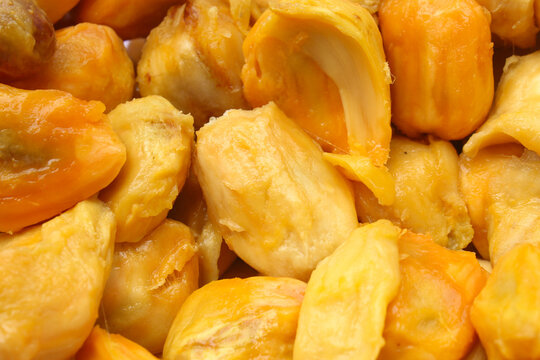 The texture of ripe cempedak fruit flesh is bright yellow