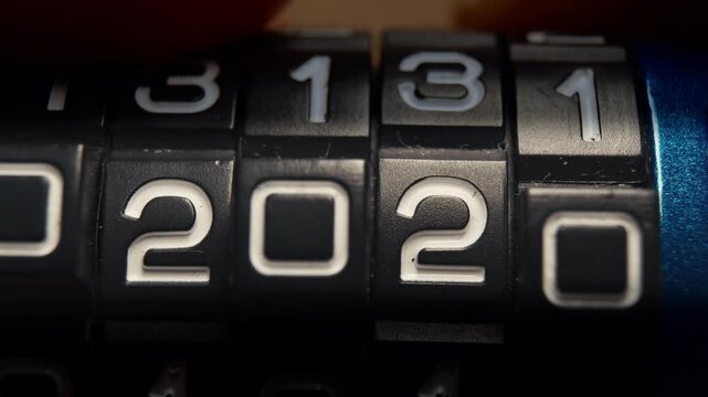 Close-up of Mechanical Combination Lock Rotating Sequentially from Year 2020 to Year 2030