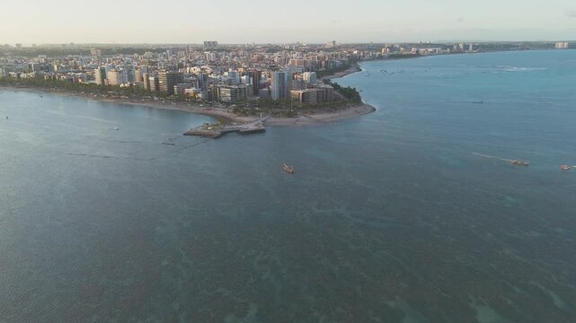 Aerial drone video of a beach in Brazil, Alagoas state, on Ponta Verde beach in the city of Maceio.