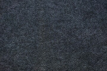 Dark grey charcoal felt fabric textile smooth matte surface texture background © Fajri Mulia Hidayat