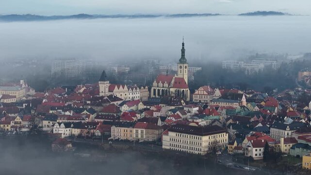TABOR historical town aerial panorama with morning fog rising above historic city and surrounding landscape.
