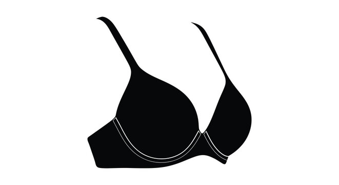 A stark black silhouette of a women s undergarment a push up bra isolated against a bright white background silhouette