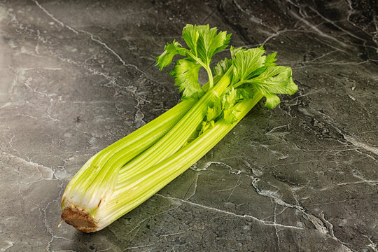 Raw green selery stem with leaves