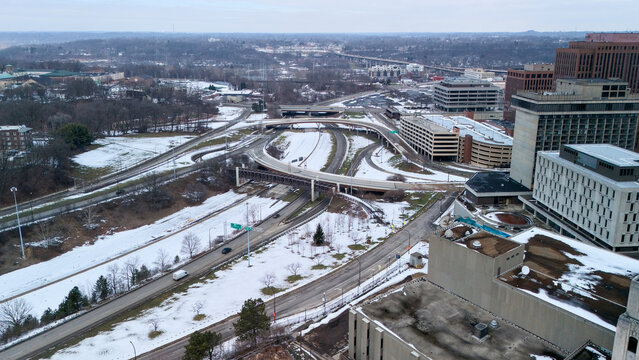 Drone aerial view of highway interchange in Akron Ohio during winter