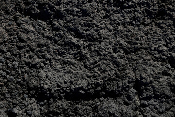 Dark volcanic rock texture.