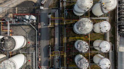 Aerial view of industrial oil storage tank farm and distribution terminal with tanker truck, Fuel...