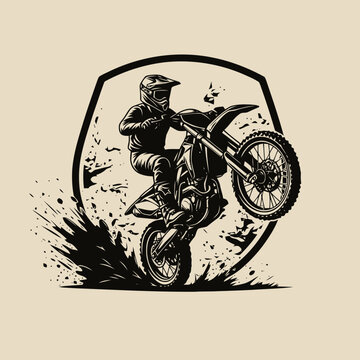 Rider performing an airborne stunt on dirt bike in mid-air, viewed from side