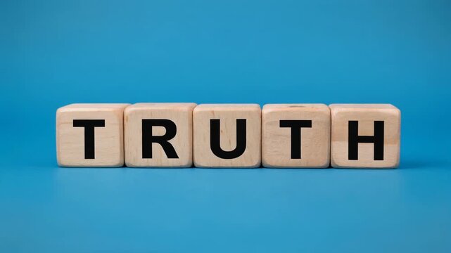 Conceptual Video Featuring Wooden Alphabet Blocks Flipping to Change the Word TRUSH into TRUTH Symbolizing Honesty and Integrity in Business