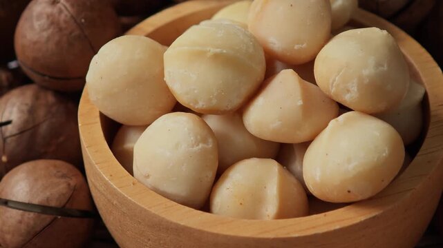 Macadamia nuts in a wood bowl	