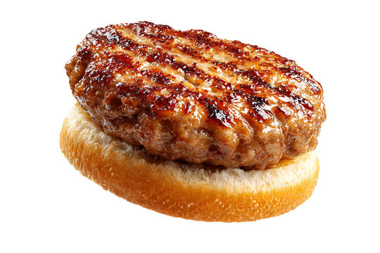 A grilled burger patty on a toasted bun on a table indoors.