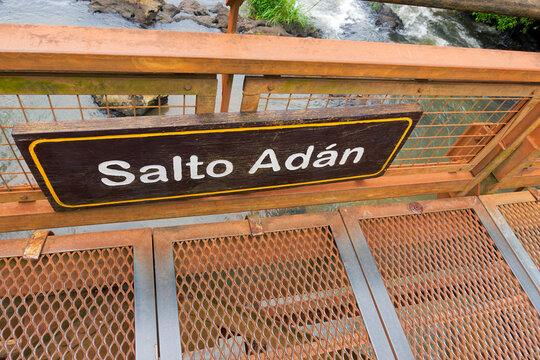 Scenic landscape with Iguazu River at Iguazu National Park with famous Iguazu Falls and Salto Adan sign on a cloudy spring day. Photo taken October 7th, 2025, Iguazu National Park, Argentina.