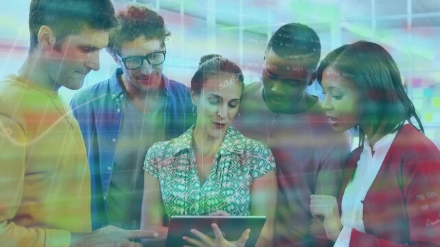 Presenting tablet central woman in patterned top scrolling in office, team pointing, reviewing data