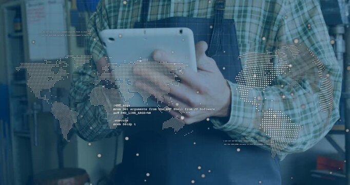 Craftsman tapping white tablet, swiping screen and activating animated world map with factory data