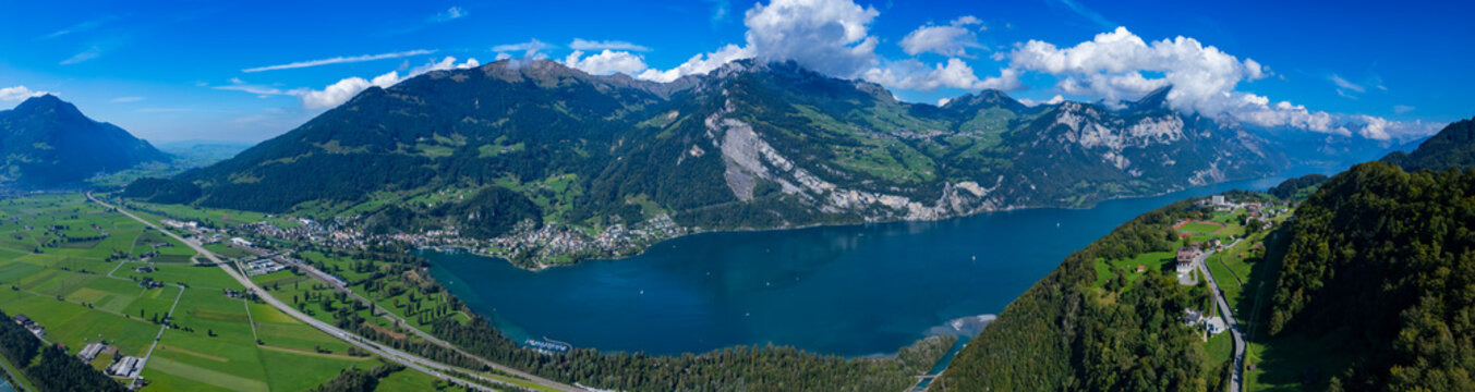 A panoramic Aerial view around the lake walensee in Switzerland on a sunny day in summer.