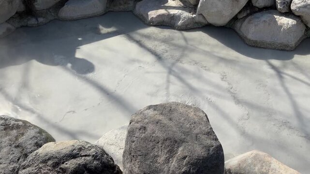 Steaming Mud Pool at Oniishibozu Jigoku Beppu Japan &ndash; Winter Geothermal Hot Spring Landscape