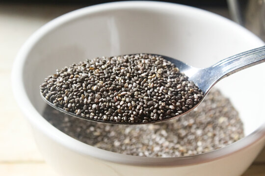 spoon of raw chia seeds