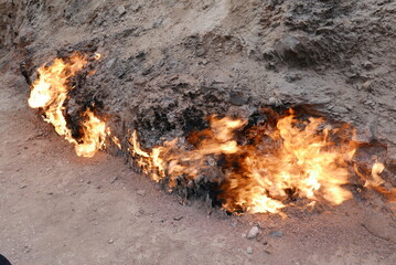 A close up view of the eternal natural gas fire at Yanar Dag on the Absheron Peninsula near Baku Azerbaijan showcasing a unique geological phenomenon