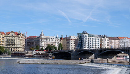 Fototapeta premium Eclectic mix of buildings along the Vltava River, Prague