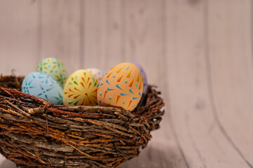 Colorful painted Easter Eggs on Easter Basket