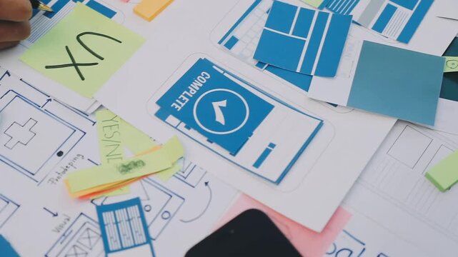 team of UI UX web designer are working together to develop mobile responsive websites with UI UX front end designer previews