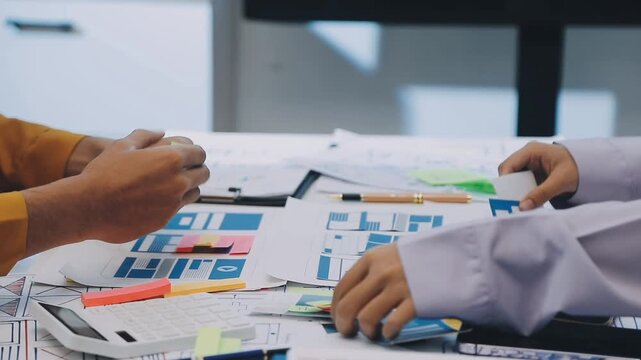 team of UI UX web designer are working together to develop mobile responsive websites with UI UX front end designer previews
