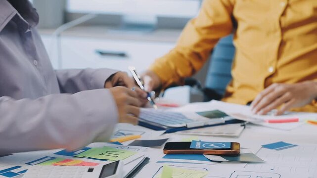 team of UI UX web designer are working together to develop mobile responsive websites with UI UX front end designer previews