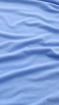 Abstract Softness Explores the fabric as a purely aesthetic element, highlighting its form and movement without specific context.
