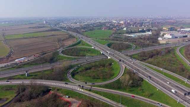 Highway cloverleaf junction aerial traffic flow road network