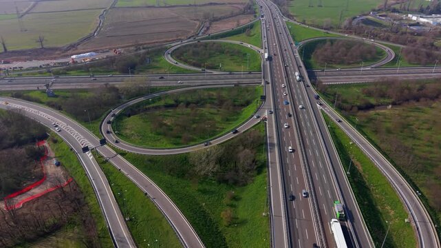 Cloverleaf highway interchange aerial view traffic infrastructure