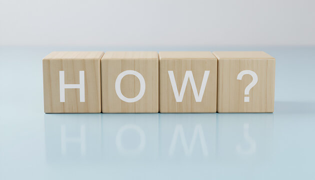 How? Four Wooden Blocks on Light Blue Surface &ndash; Minimalist Word Blocks

