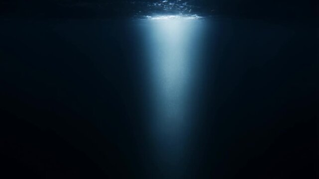 A mesmerizing sequence of underwater light beams piercing through dark depths, creating ethereal patterns as they illuminate suspended particles in the water.