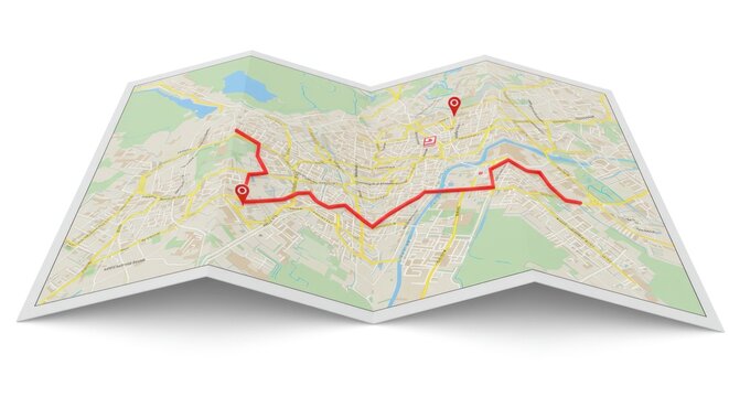 A red route marked on a folded map with a path through various locations and landmarks