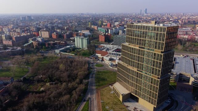 An aerial perspective of a modern city, with towering skyscrapers punctuating the horizon and intricate urban sprawl weaving across the landscape.