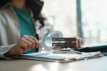 Businesswoman analyzing digital login interface with magnifying glass on smartphone and laptop, representing cybersecurity audit, identity verification, data protection, secure authentication
