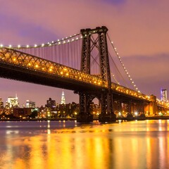 Fototapeta premium Illuminated Williamsburg Bridge at Night - A Stunning New York City View.