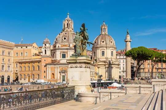 Architecture of Venice square (Piazza Venezia) with Vittoriano monument, churches and Trajan column, Rome, Italy