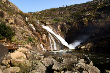 Ézaro Waterfall. Located in Dumbría (A Coruña, Galicia), it is the only place in Europe where a river, the Xallas, flows directly into the sea via a waterfall.