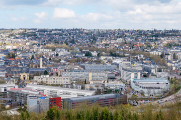 Obraz premium Rouen, France panoramic view of historic city with dense rooftops, towers and classic French architecture. Scenic Normandy destination, European culture, heritage tourism and urban landscape