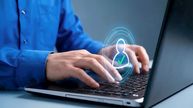 Businessperson typing on laptop with holographic user authentication icon, visualizing secure digital identity verification, login access control, and zero trust cybersecurity technology concept.